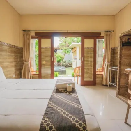 Pondok Lulik Homestay Canggu Отели рядом с достопримечательностью «Пляж Чангу»
