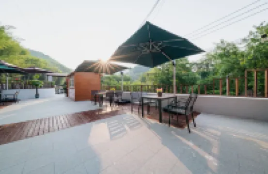 Floral Hotel·Qinglong Township, Longge Village, Hongcun Group, Qinglong Dispatch 150 meters