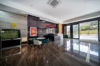 Tong Xing Business Travel Hotel (Longdongbao Airport) - 2-نجوم