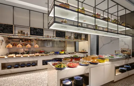 Vance Hotel (East Railway Station Airport Road Branch) Отели рядом с достопримечательностью «Caozhuang Park»