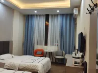 Shidian Magnolia Business Hotel Hotels in Shidian