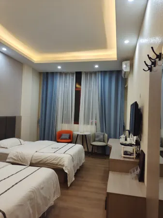 Shidian Magnolia Business Hotel Отели рядом с достопримечательностью «Yaoguan Ancient Town»