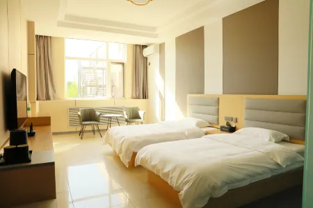 Shizuishan Wanshida Hotel Отели рядом с достопримечательностью «Ningxia Institute of Technology»