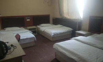 Qira Xinglong Hotel