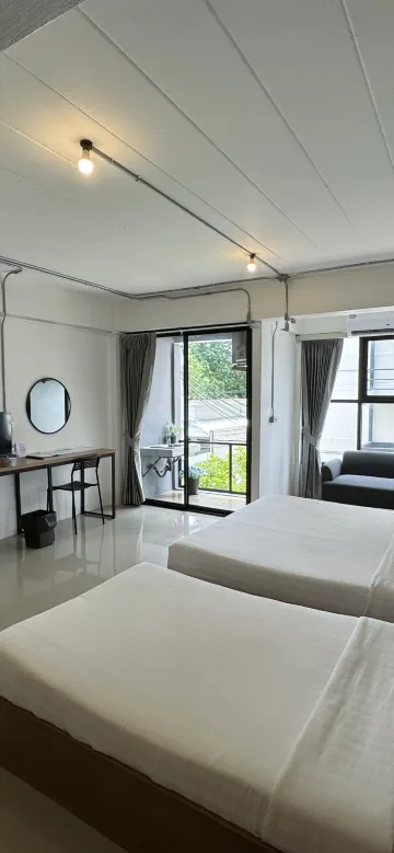 ห้องดีลักซ์พร้อมเตียงคิงไซส์และเตียงเดี่ยว
