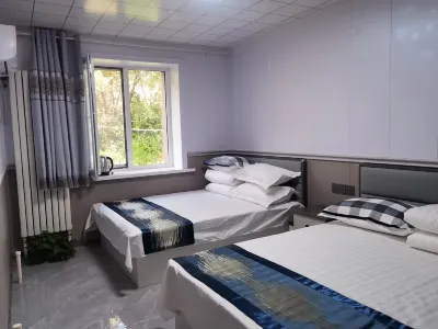 聚鑫来ゲストハウス（ハルビン医科大学付属二院） ハルビン医科大学付属二院／ハルビン南駅のホテル