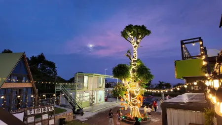 olive Отели рядом с достопримечательностью «Qing'aowan Astronomy Square»