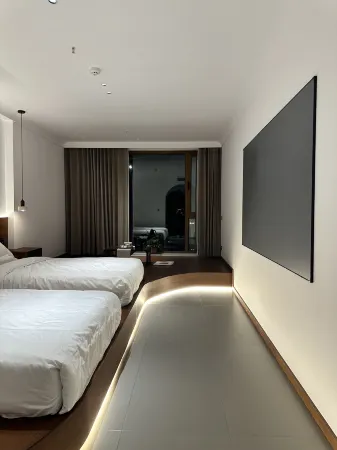 Xingcheng Mountain Hidden Sea Hotel Отели рядом с достопримечательностью «Three Reef Range Rover»