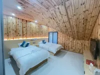 Hundreds of miles of rhododendrons, clouds, and flowers are all Qianlaid Hotels near Yi Mountain Flower Valley Scenic Area