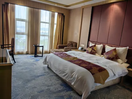 Junlai Luxury Business Hotel Отели рядом с достопримечательностью «Huajianchi·chunshang Hot Spring Theme Park»