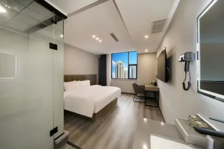 Pai Esports Hotel (Xiangcheng Lianhua Avenue People's Park Branch) Отели рядом с достопримечательностью «Nandun Ancient City»