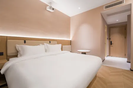 Shanghai Yiheju | Relaxed· Pleasant Designer Hotel (Jiading West Subway Station) Отели рядом с достопримечательностью «Shanghai Open University Jiading Branch»