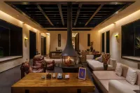 Guoluo Zhuosa Pastoral Snow Mountain Ranch Homestay - bar