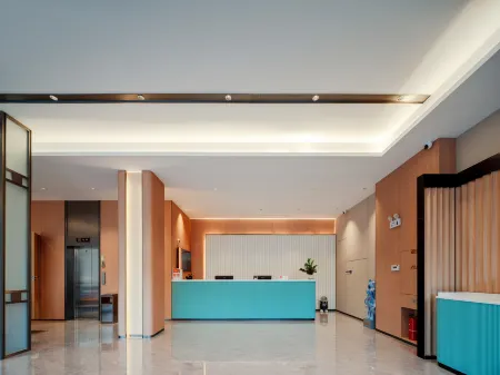 Qingfeng Hotel Отели рядом с достопримечательностью «Baima Mountain»