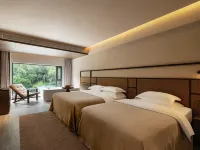 Jiuzhaigou · Mistshroud Mountains & Sunset Glow Snowscape · Sukoon Village Hotels in Jiuzhaigou