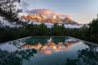 Misty Forest | Golden Dawn on Snow Peaks · Wild Luxury Secluded Mountain Lodge - Romantic