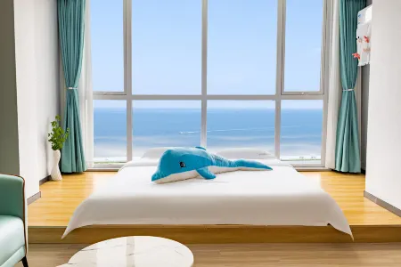 Rongcheng Xianghai Impression Holiday Apartment Отели рядом с достопримечательностью «Dimond Beach Bath of DreamSea»