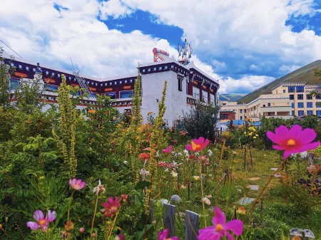 Lamu Tibetan Home Inn Отели в г. Даофу