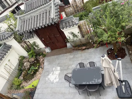 Changxing Tangchao Twelve Square Wubenfang Yinshuishanju (Shuikou Tea Culture Scenic Area Branch) Отели рядом с достопримечательностью «The Tribute Tea Museum of Tang Daynsaty»