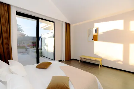 Jiangmu 377 Garden Private Villa Отели рядом с достопримечательностью «Xishuangbanna Folk Custom Garden»