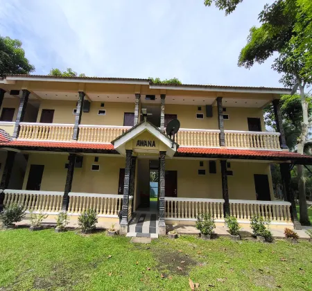 Hotel O Rumah Rehat Awana Отели рядом с достопримечательностью «Парк Аспен Вижен Сити Сентрал»