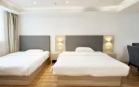 Huating Hotel (Wuhan Jiangxia Yijia Shopping Plaza Branch) Hotel in zona CPC Wuhan Jiangxia District Committee Party School