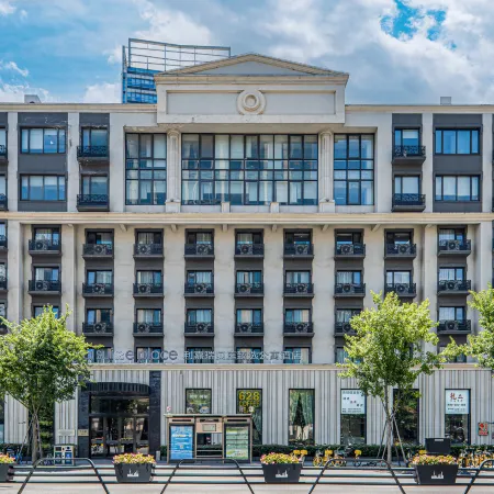 Shanghai Hongqiao Lijia Suisse Place Serviced Apartment (Loushanguan Road Subway Station) Отели рядом с достопримечательностью «Выставочный центр Intex Shanghai»