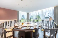 Jixi Xinghui Chinese Inn - พร้อมอาหารเช้า