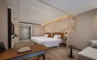 Vienna International Hotel(Zhoukou Wanguo Car World Store)