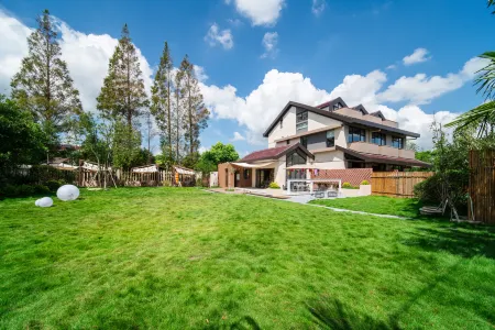 JIU JIE MIN SU Отели рядом с достопримечательностью «Shanghai Wild Animal Park»