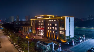 Junfu XiaoYinPuShe Hotel Отели рядом с достопримечательностью «Универмаг Wu»