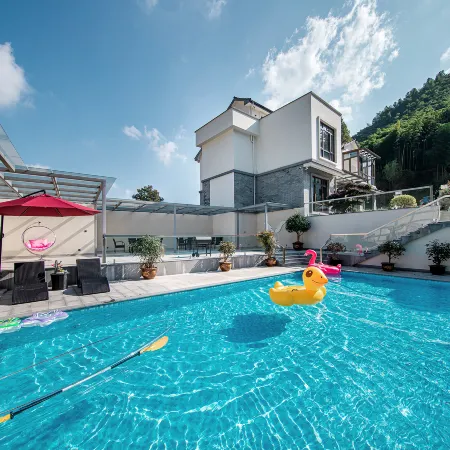 On this side of the mountain · Axin's home Eric designed swimming pool vacation