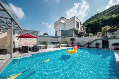 On this side of the mountain · Axin's home Eric designed swimming pool vacation