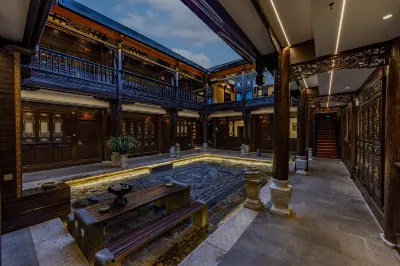 Jiuqi Fuxiang Inn (Lijiang Ancient City Dashuiche Branch) Hôtels à : Lijiang