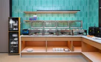 โรงแรมอินน์เดลิคาซี่ แอนด์ วอร์ม·การ์เดนเนีย บลอสซัม - พร้อมอาหารเช้า