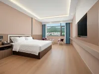 Xingyi Baximan Hotel (Xingyi Minzu Normal University) โรงแรมในซิงอี้