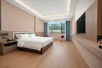 Xingyi Baximan Hotel (Xingyi Minzu Normal University)