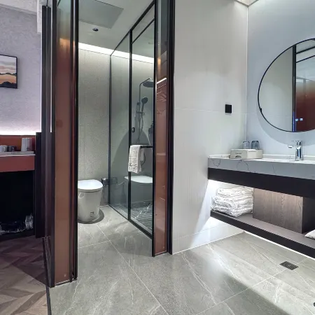 Xinglin Design Hotel (Luliang Jinhui Commercial City)