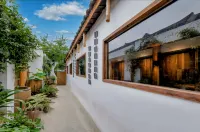Moshu Homestay (Meishan East Station & Sansu Temple Branch) - بار