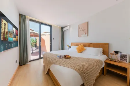 Slow Life Bali Coast Holiday Hotel