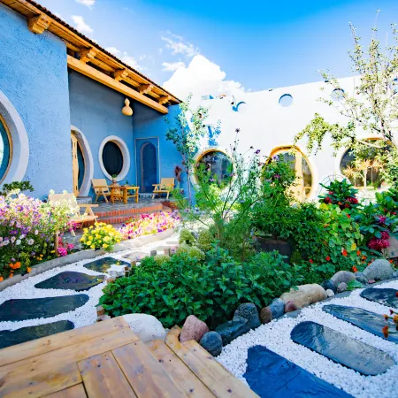 Tex Rongshe Courtyard Inn