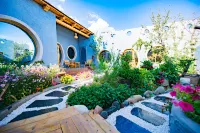Tex Rongshe Courtyard Inn