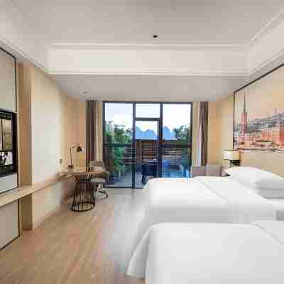 維也納國際酒店（荔浦濱江路市府店） Rooms
