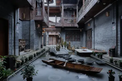 Zhuoheju Inn Hotels near Courtyard of Family Fan
