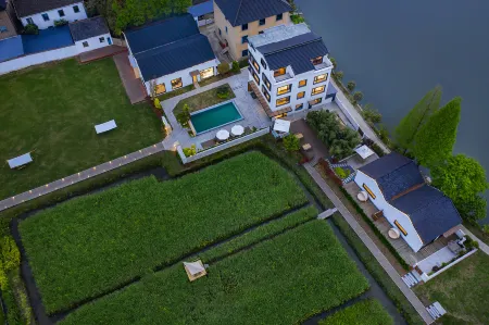 HuZhou Tingjian Homestay Отели рядом с достопримечательностью «Imperial Palace of Emperor Chenwu»