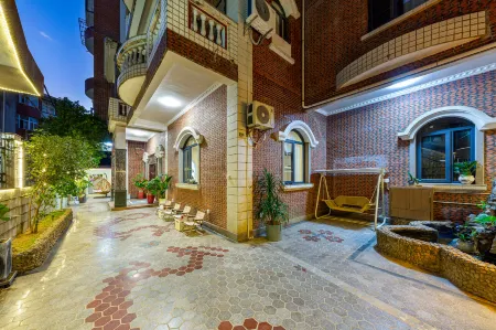 QuanZhou ShunLi GuestHouse Отели рядом с достопримечательностью «Fujian Electric Power Vocational and Technical College»