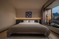 Mengluo Xinghe Hotel