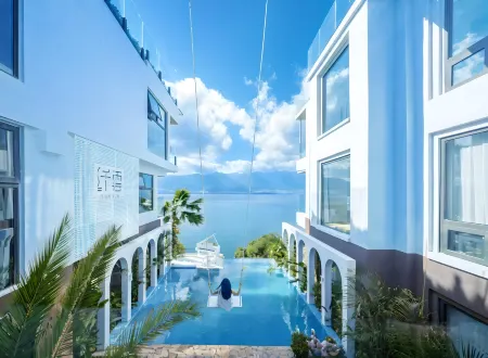 Xianyun Astrum Pool | Dessert · 360 ° Cliff Sea View Music Hot Spring Hotel (Dali Erhai Branch) Отели рядом с достопримечательностью «Yuxi University of Applied Technology»