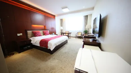 Wanki Hotel Отели в г. Синьань