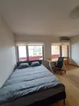 Cozy apartment - 100m beach, AC, workstation, balcony, backyard, yoga mat Hotels in Babite parish